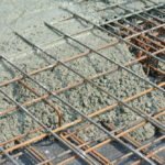 steel rebar in wet cement